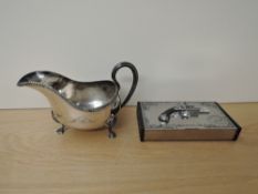 A Silver plated Sauce Boat marked Elkington, engraved 2nd Warwikshire along with a chrome Cigar