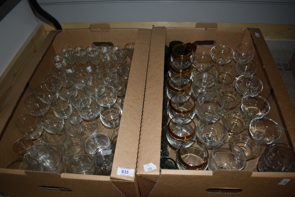 Two cartons of assorted drinking glasses.
