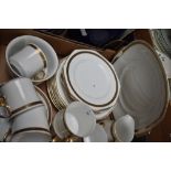 A blended part dinner and tea service in white, having gilt design.