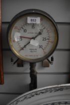 A vintage metal cased pressure/ altitude gauge