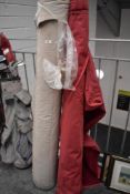 Two rolls of velvet material one beige and part roll of red AF