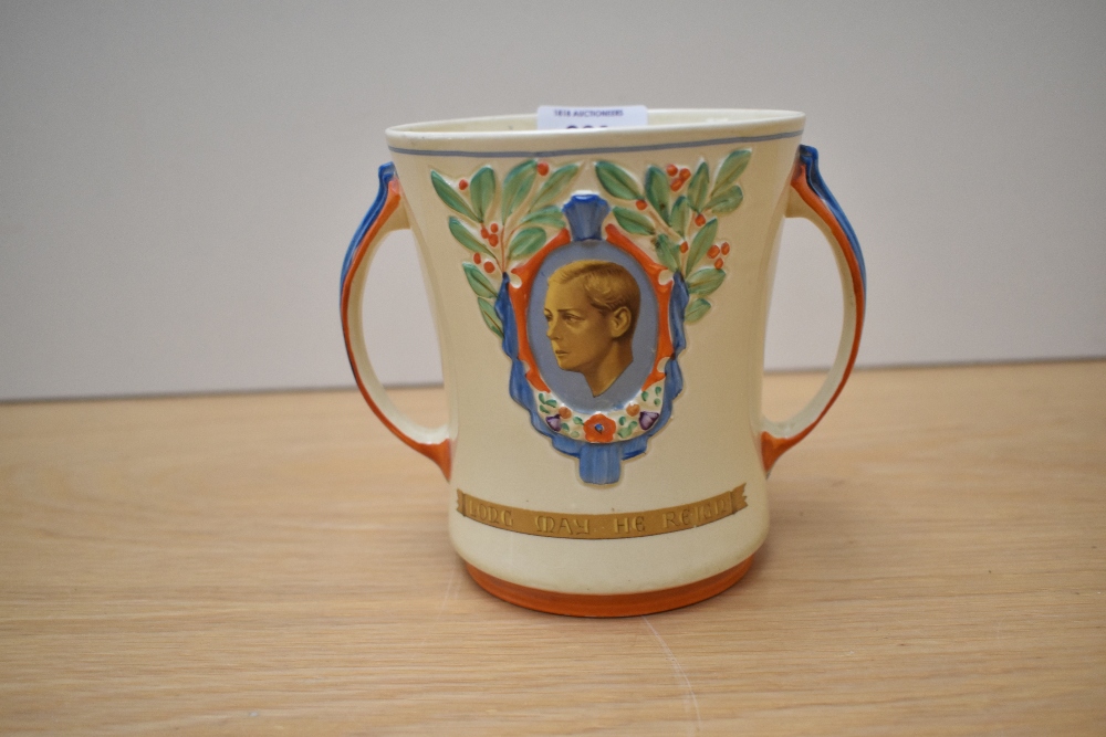 An Edward VIII 1936 coronation mug, having wind up musical mechanism to base, AF