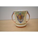 An Edward VIII 1936 coronation mug, having wind up musical mechanism to base, AF