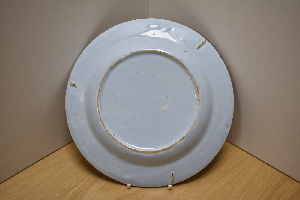 A 19th Century Delft glazed plate, possibly English, diameter 23cm, two Newhall porcelain saucers, - Image 2 of 2