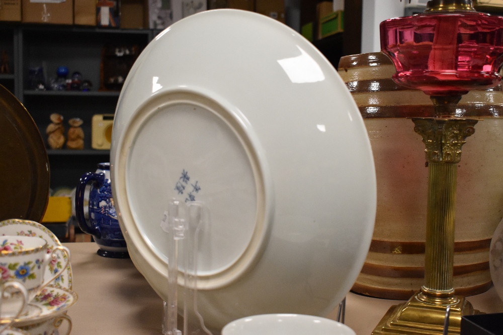 A large Chinese blue and white pottery charger, of dishes circular form decorated with stylised - Image 8 of 15