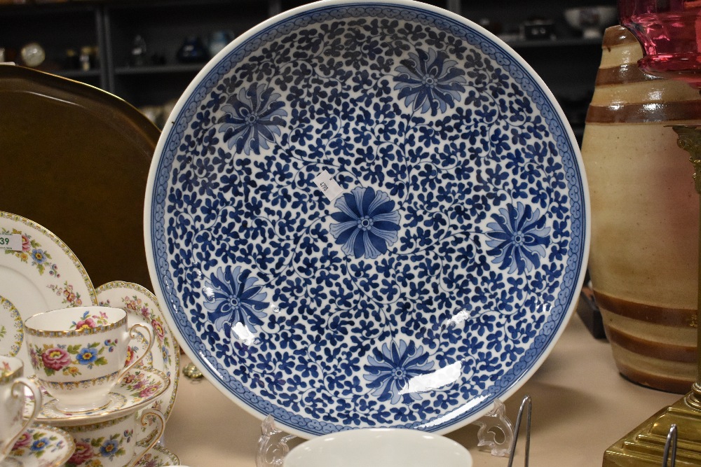 A large Chinese blue and white pottery charger, of dishes circular form decorated with stylised - Image 5 of 15