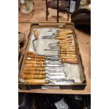 A selection of wooden handled and steel 'bladed' woodworking chisels, mainly marked as Marples but