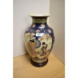 A 20th century eastern pottery baluster vase, in the Satsuma style, marked 'Satsuma' to base, on a