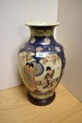 A 20th century eastern pottery baluster vase, in the Satsuma style, marked 'Satsuma' to base, on a