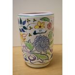 A 1930s Poole pottery vase, with floral design, having impressed and painted marks to the base,