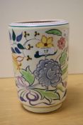 A 1930s Poole pottery vase, with floral design, having impressed and painted marks to the base,