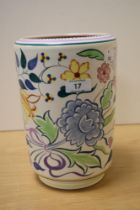 A 1930s Poole pottery vase, with floral design, having impressed and painted marks to the base,