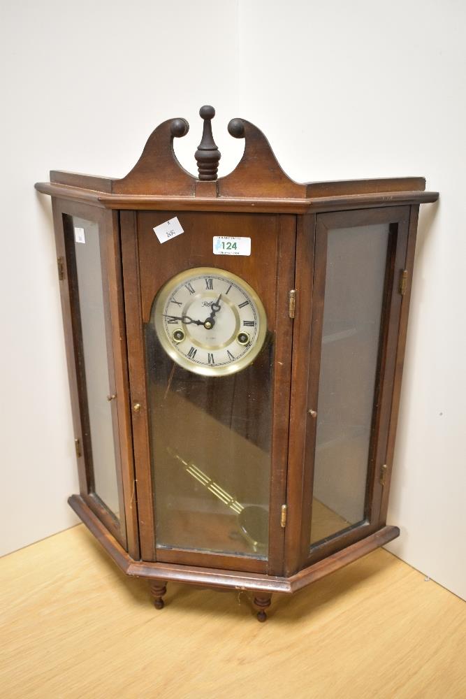 A traditionally styled glass and wood cased 'Reflex' wall clock, having 31 day movement.