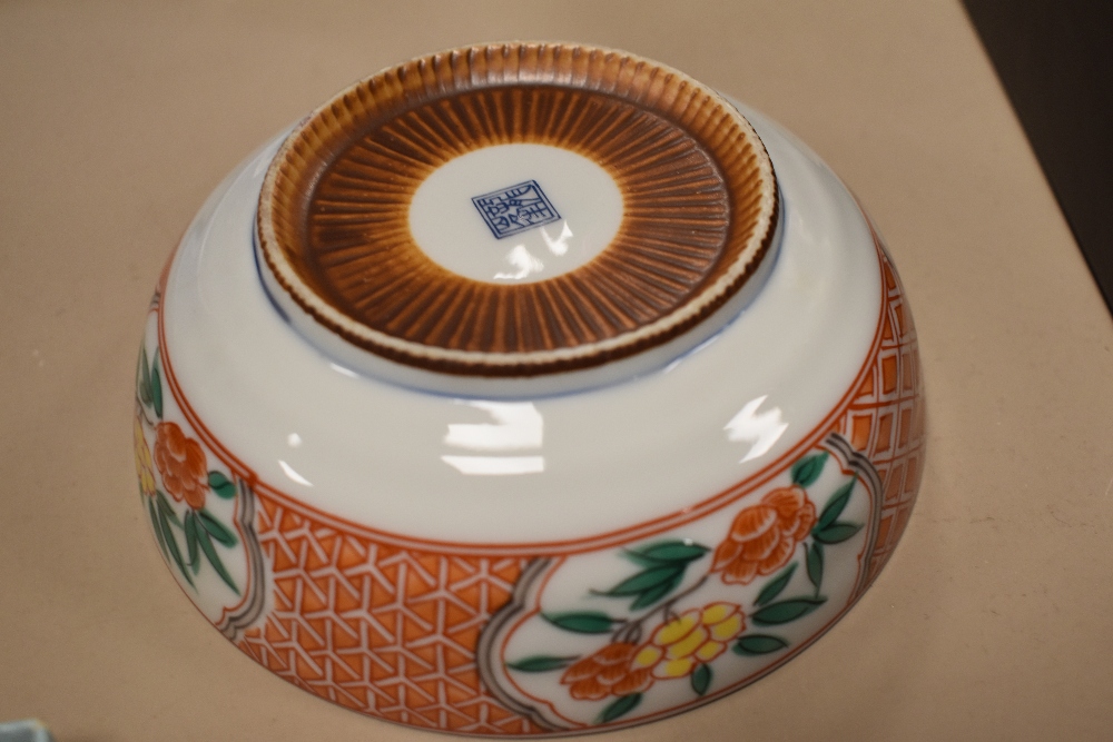 A large Chinese blue and white pottery charger, of dishes circular form decorated with stylised - Image 12 of 15