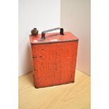 A vintage red-painted Shell Motor Spirit fuel can