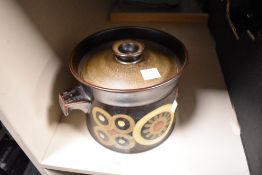 A Denby Arabesque pattern casserole dish with cover, printed mark to underside