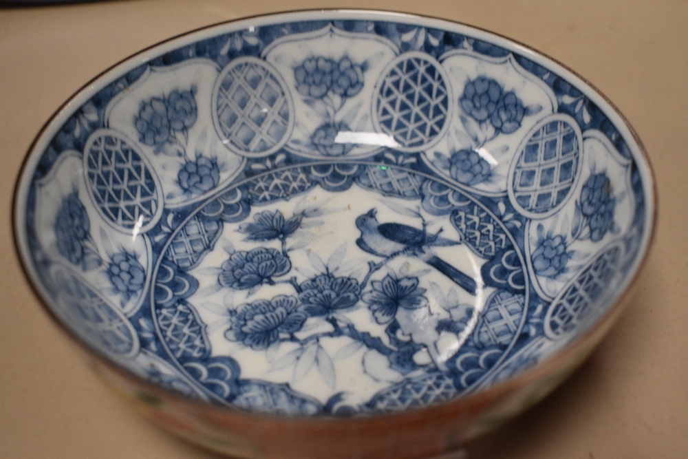 A large Chinese blue and white pottery charger, of dishes circular form decorated with stylised - Image 14 of 15