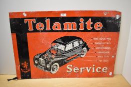 A vintage Telamite Service tin advertising sign, painted in red, white and black 49cm x 74cm some
