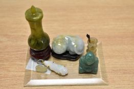 A collection of carved Chinese green stone items, to include; sleeping cat, vase, pendant, bamboo s