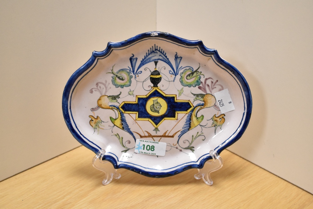 A continental faience shallow dish of shaped form.