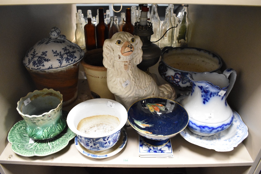 A Chinese blue white and gilt lidded jar and a ginger jar void of lid.