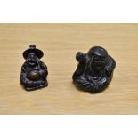 Two Chinese cast resin Buddha figures, the largest measures 5cm tall