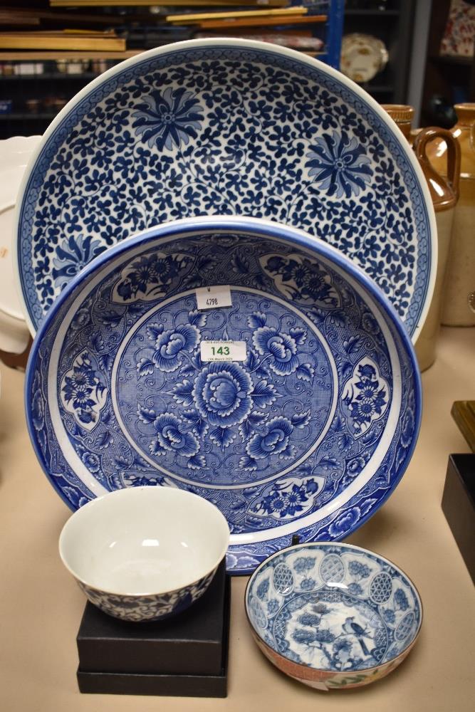 A large Chinese blue and white pottery charger, of dishes circular form decorated with stylised