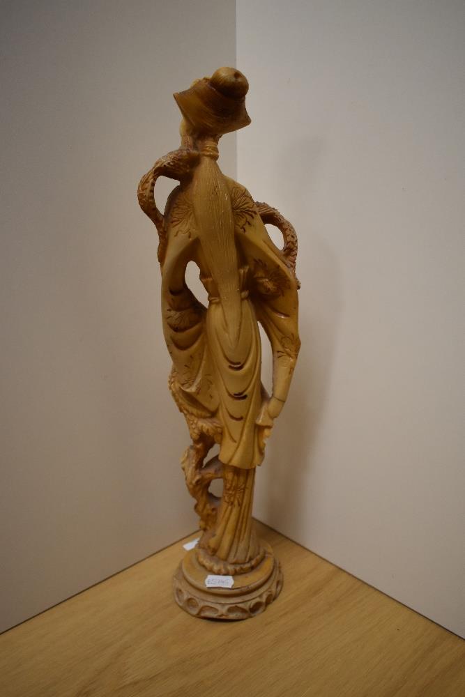 A large cast-resin (to simulate ivory) Oriental figure of a robed female with exotic birds 46cm - Image 2 of 2