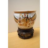 A 20th Century Chinese Satsuma ware style jardiniere, decorated with groups of figures, on stand,