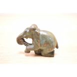 A late 20th Century bronze elephant study, with incised 'D.M' initials to the base (possibly