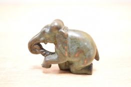 A late 20th Century bronze elephant study, with incised 'D.M' initials to the base (possibly