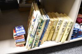 A group of eight vintage Rupert annuals, together with six Enid Blyton volumes