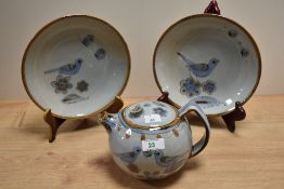 A mid-20th Century Mexican El Palomar studio pottery teapot, together with two dishes of matching