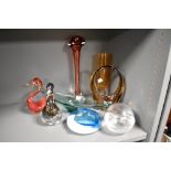 A collection of vintage art glass, including ducks and red and amber glass vases, blue bowl and