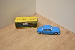 A Nicky Toys die-cast, 195 Jaguar 3.4 MKII, blue with white interior, base marked Dinky, in original