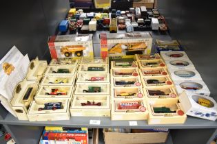 A shelf of modern die-casts, Joal Compact C225 Hydraulic Excavator and 773B Dumper Truck, both boxed