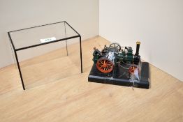 A modern Bassett Lowke limited edition Traction Steam Engine with two figures, on plinth in