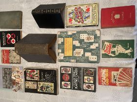A box of vintage Playing Card Game Volumes, Official Rules, History, Collecting etc