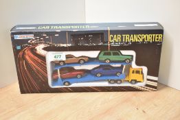 A Lone Star die-cast set, 1256 Car Transporter withy four cars, in original packaging and box