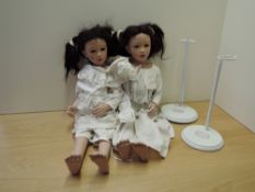 Two German rubber Gotz Dolls, both dressed, both marked PSH, designed by Philip Heath, lengths
