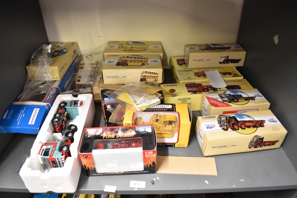 A shelf of modern diecasts, Corgi Classics x 10, Wagons and Buses, First Gear Fire Dozer x2, First