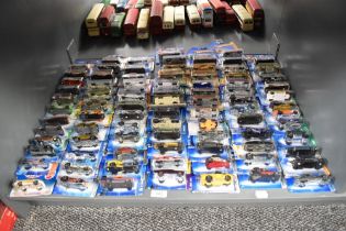 A shelf of 1990's, 2000's Mattel Hot Wheels die-casts, 86 in total all on bubble cards