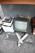 An Amstrad 64K Colour Personal Computer with monitor, 4 part operating system set and Mini Office