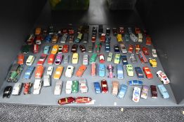A shelf of playuworn die-casts, Matchbox, Husky, Guisval etc, most in good condition with little