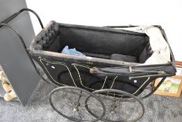 A Victorian Coach Built Childs Double Pram having spoked wheels and folding hood