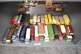 A shelf of Corgi and similar die-casts, Wagons, Articulated Trucks etc