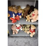 Two shelves of mainly modern Teddy Bears including Paddington, Barton Grange 2015 & 2017. TY etc