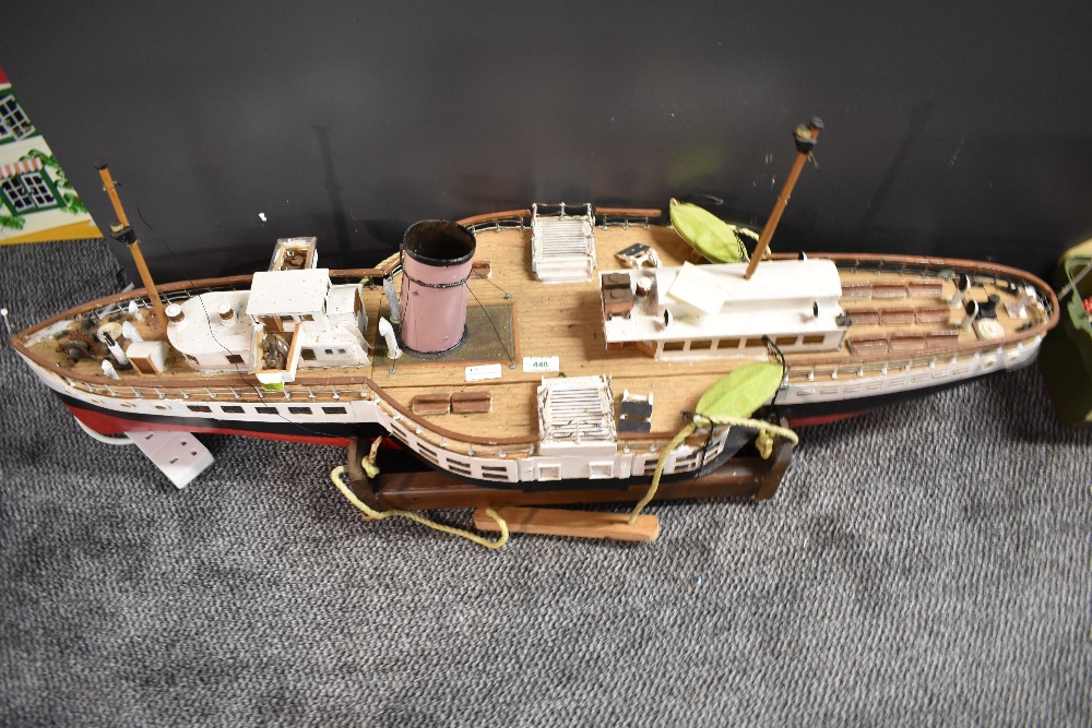 A scratch built wooden model Boat based on the Paddle Steamer, complete with belt driven brass