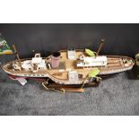 A scratch built wooden model Boat based on the Paddle Steamer, complete with belt driven brass