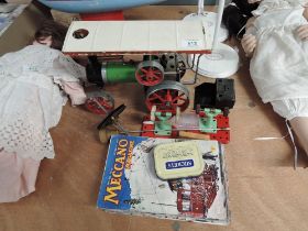 A Mamod TE1 Live Steam Tractor with accessories and burner along with 7 1950's Meccano Magazines